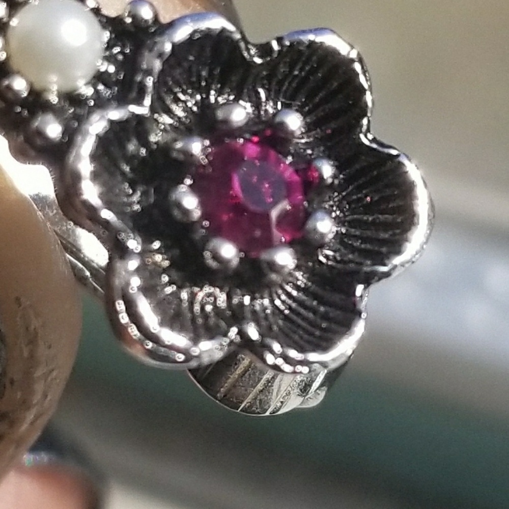 Avon silver tone clip on earrings floral (studs)